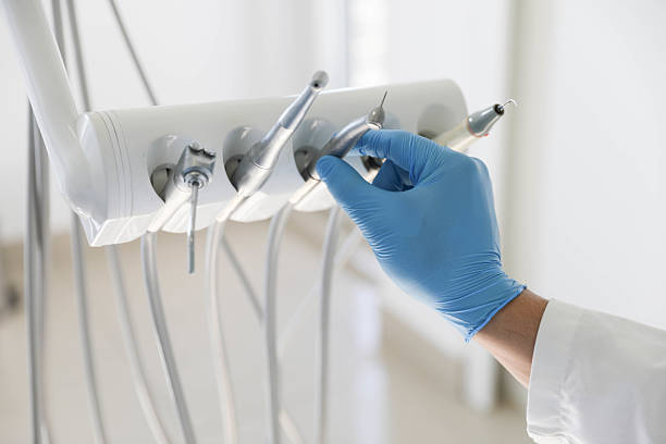 Professional Tooth Extraction technician working in San Rafael, NM